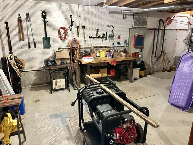156 Hussey Road Parsonsfield, ME 04047 - Photo 18 of 25 18. Basement - Workbench