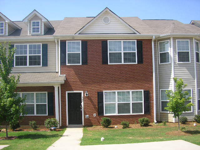 1746 Fielding Way Hampton, GA 30228 - Photo 1 of 1 front view of a house with a yard