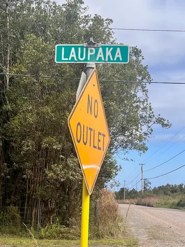 a sign that is on the side of a building