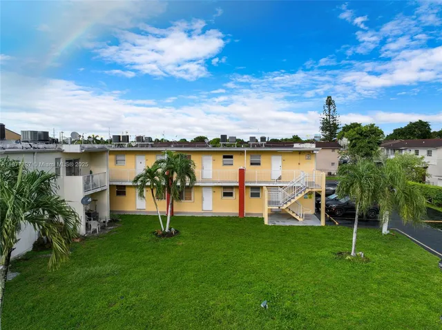 a view of a lake with a park