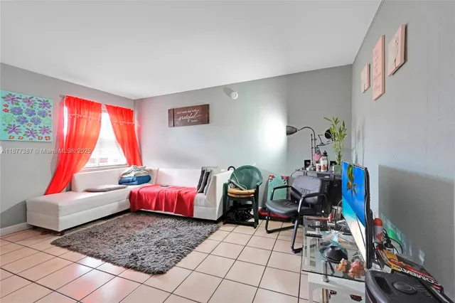 a living room with furniture and a couch