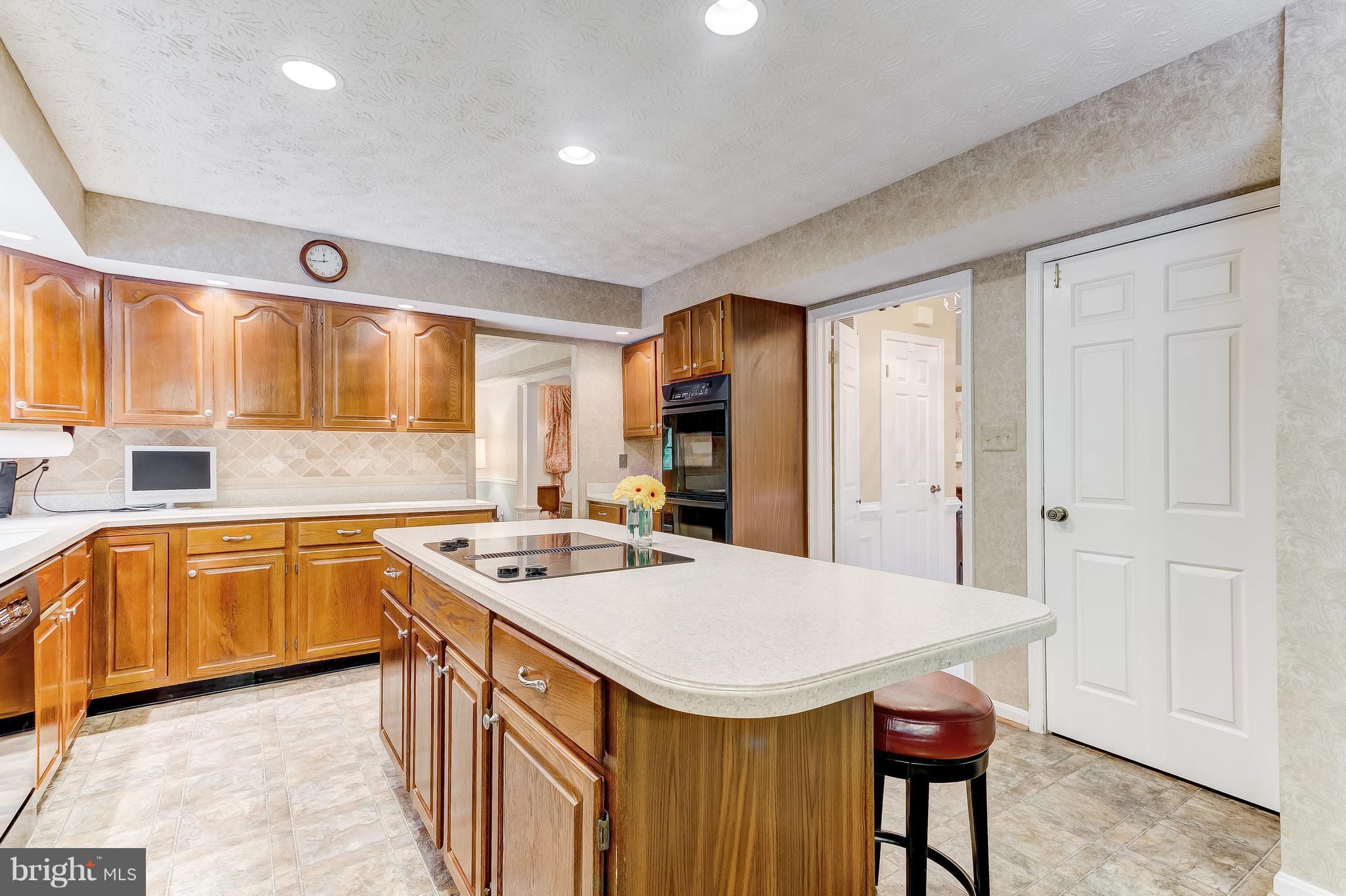 915 Stags Head Road Baltimore, MD 21286 - Photo 3 of 30 Kitchen has Pantry and Laundry Area