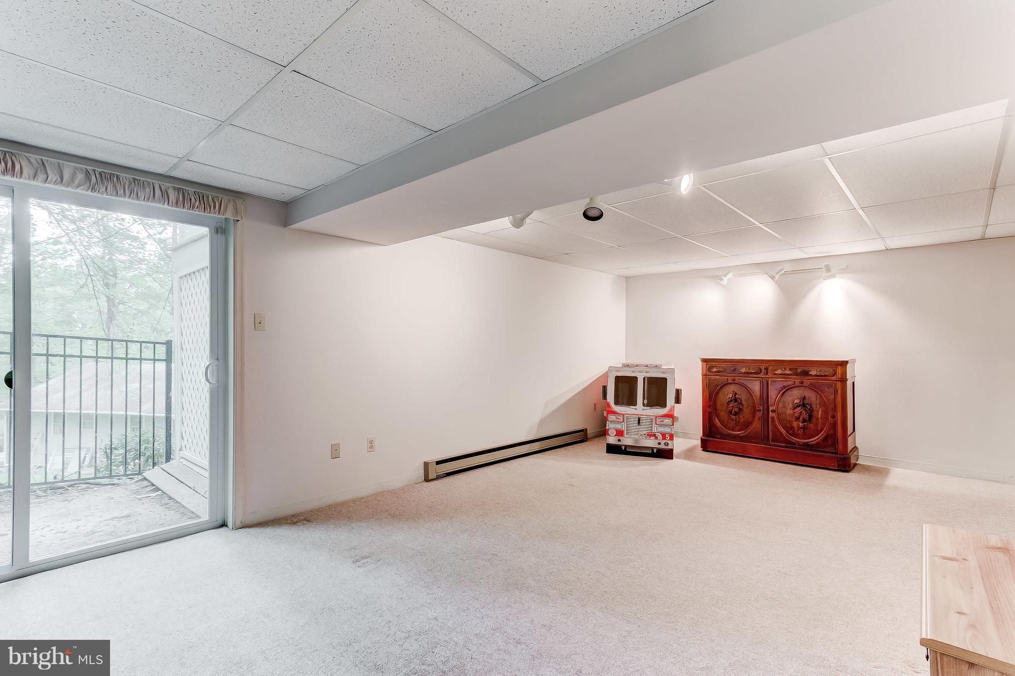 915 Stags Head Road Baltimore, MD 21286 - Photo 23 of 30 New lower level sliders to side of house