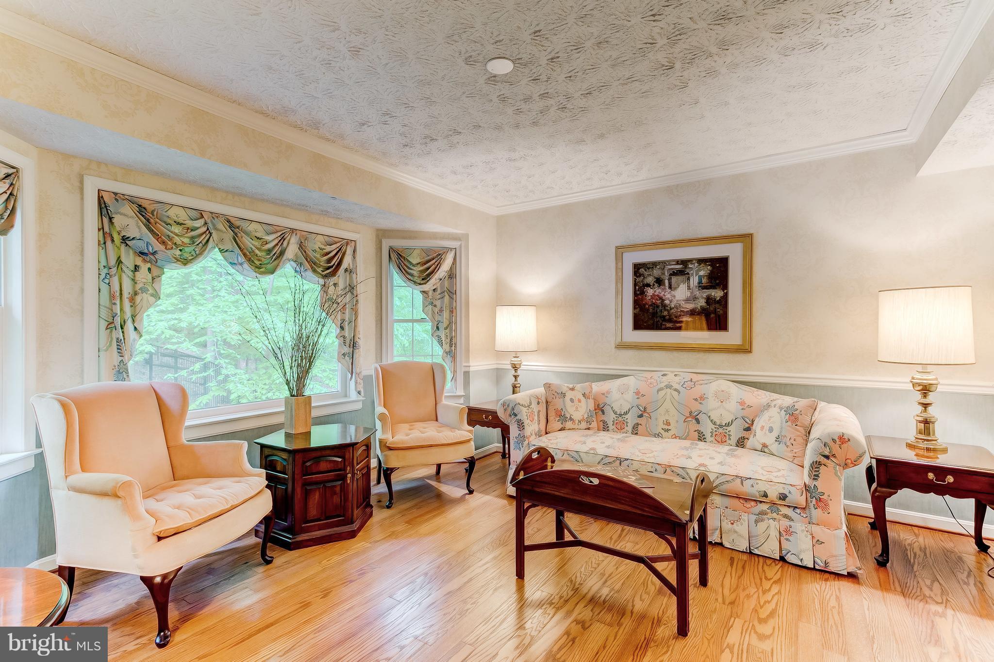 915 Stags Head Road Baltimore, MD 21286 - Photo 8 of 30 Wood Floors/Picture window overlooks beautiful lot