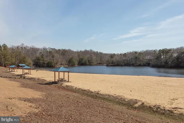 a view of lake with mountain in background