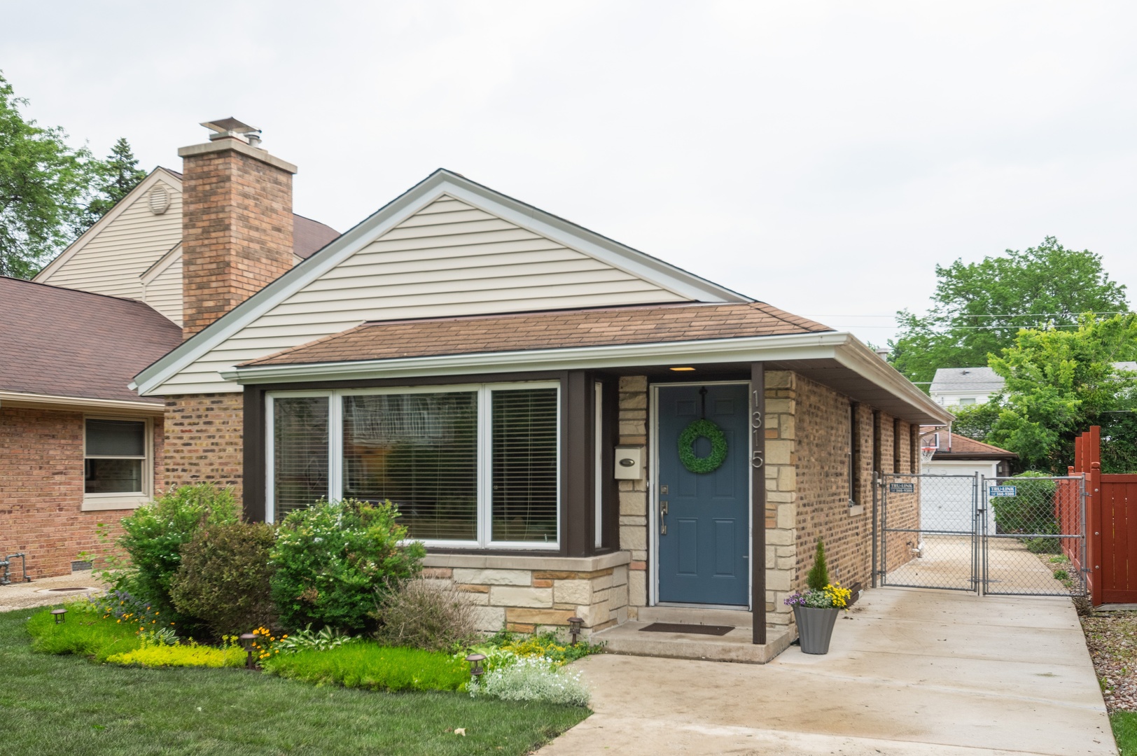 1315 Elliott Street Park Ridge, IL 60068 - Photo 1 of 10 front view of a house with a yard