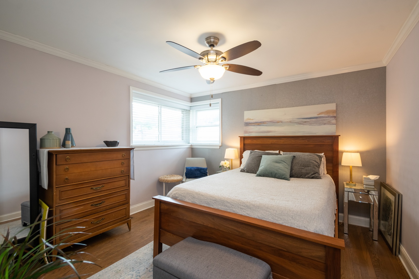 1315 Elliott Street Park Ridge, IL 60068 - Photo 6 of 10 a bedroom with a bed and a chandelier