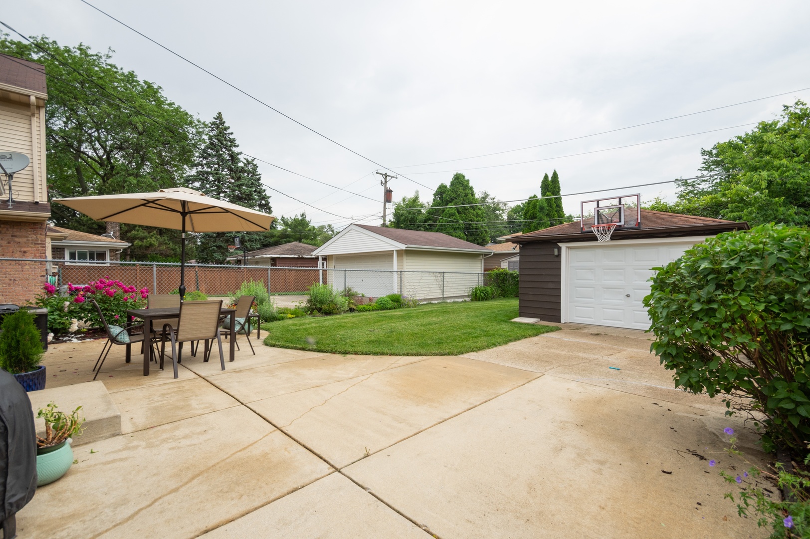 1315 Elliott Street Park Ridge, IL 60068 - Photo 10 of 10 a view of a patio with a table and chairs under an umbrella