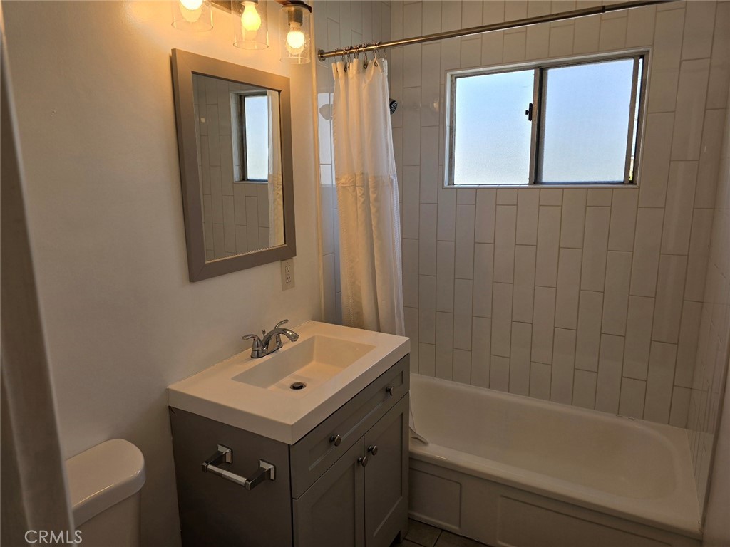 12503 Grevillea Avenue, Unit C Hawthorne, CA 90250 - Photo 10 of 13 a bathroom with a sink toilet and shower