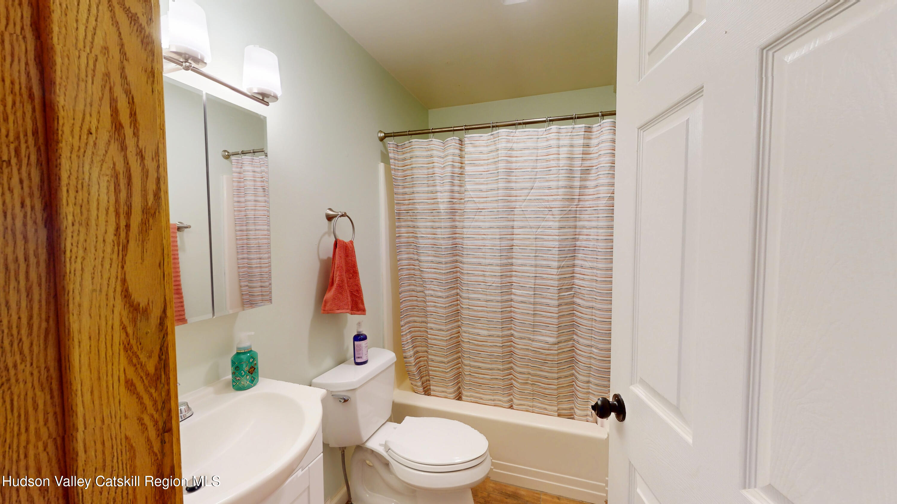 175 Jordan Road Coxsackie, NY 12051 - Photo 16 of 32 a white toilet sitting next to a bathroom sink