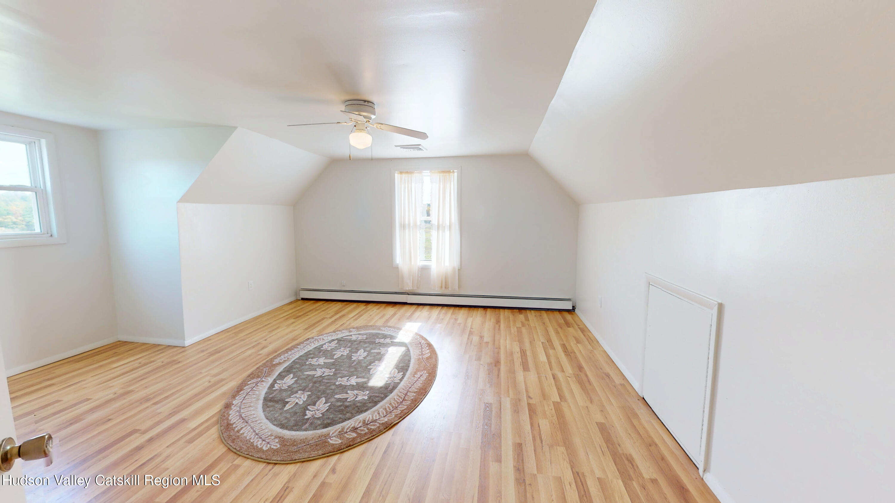 175 Jordan Road Coxsackie, NY 12051 - Photo 18 of 32 wooden floor in an empty room with a window