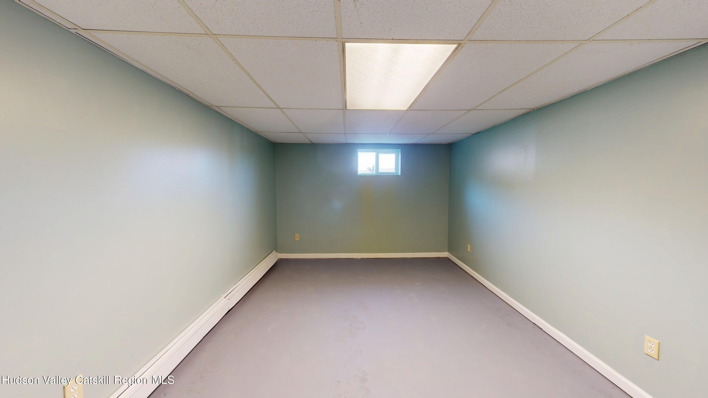 175 Jordan Road Coxsackie, NY 12051 - Photo 28 of 32 an empty room with a empty space and windows