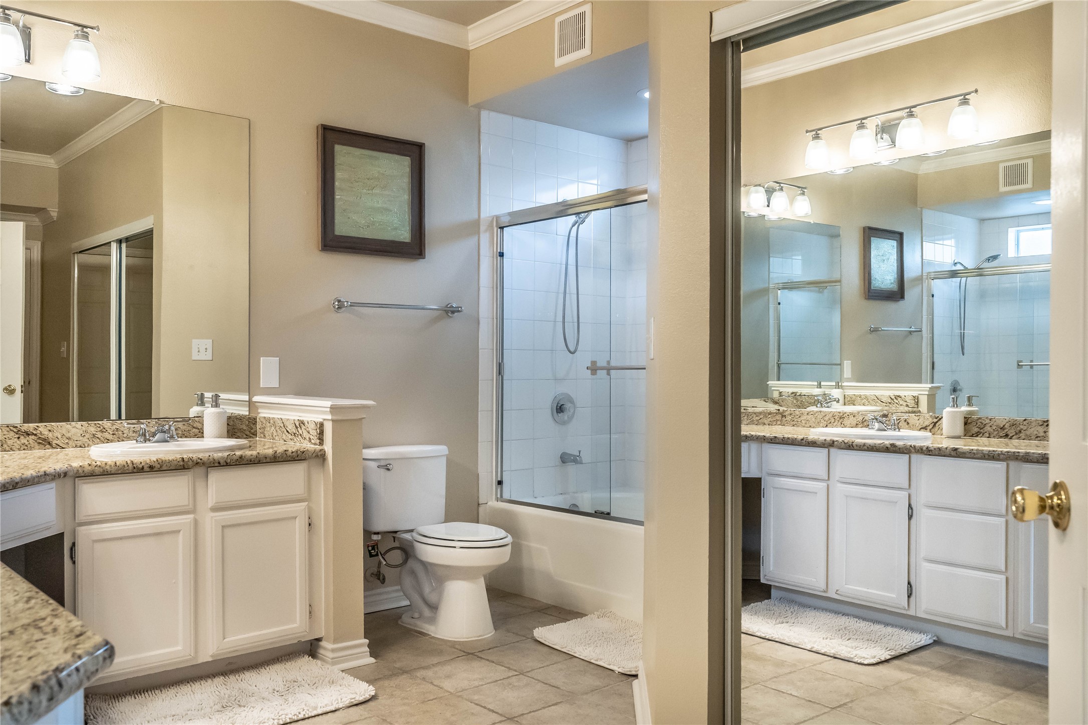 2111 Welch Street, Unit A232 Houston, TX 77019 - Photo 12 of 20 a bathroom with a granite countertop sink toilet and shower