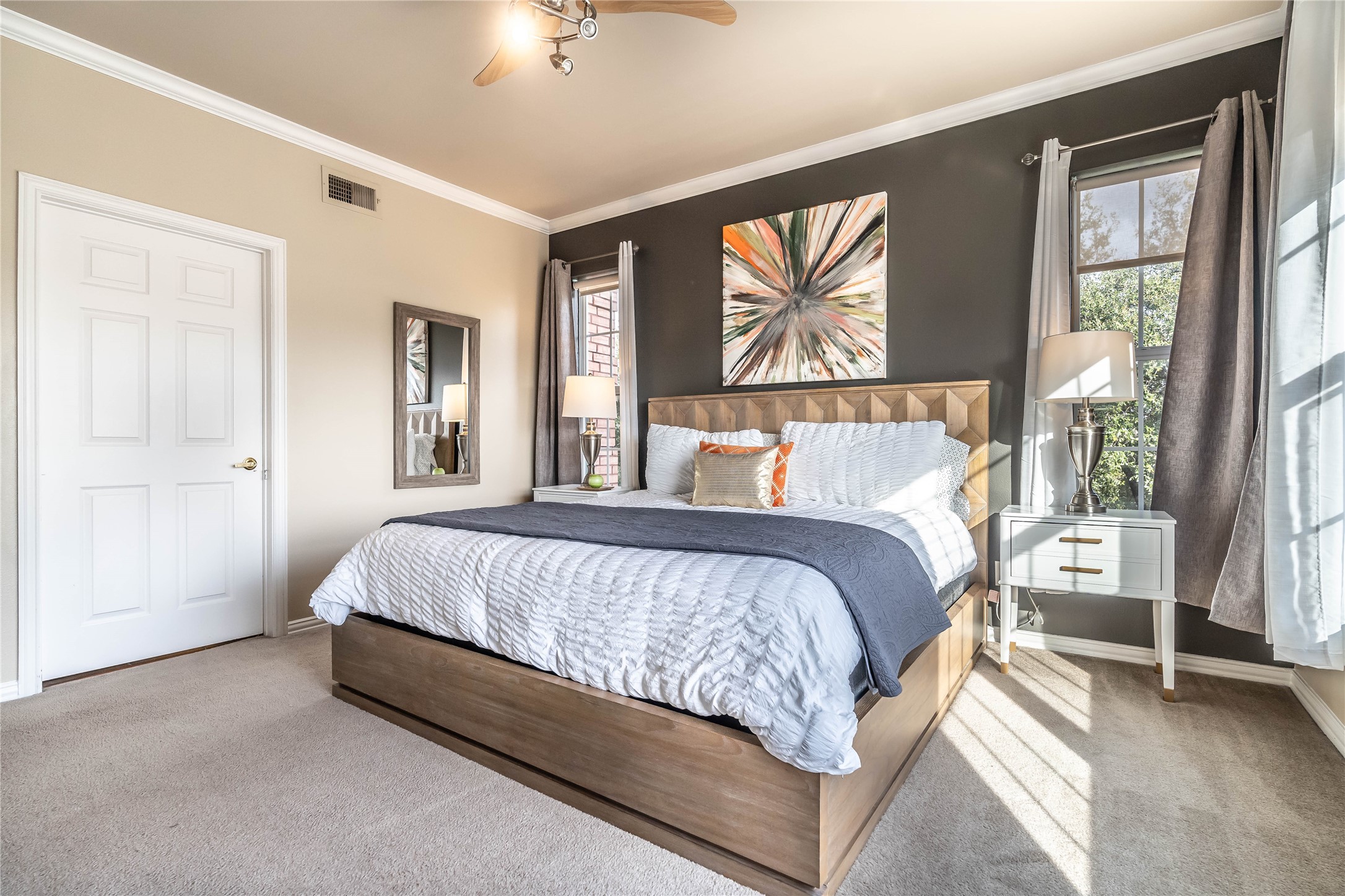 2111 Welch Street, Unit A232 Houston, TX 77019 - Photo 8 of 20 a bed sitting in a bedroom next to a window