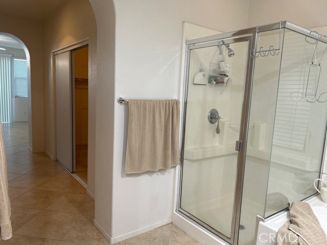 32536 Cottonwood Road Winchester, CA 92596 - Photo 7 of 10 a bathroom with a shower and a mirror