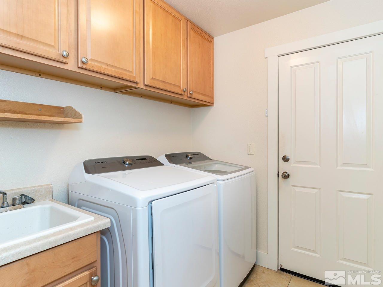 5021 Fall Colors Court Reno, NV 89519 - Photo 18 of 26 a utility room with dryer and washer