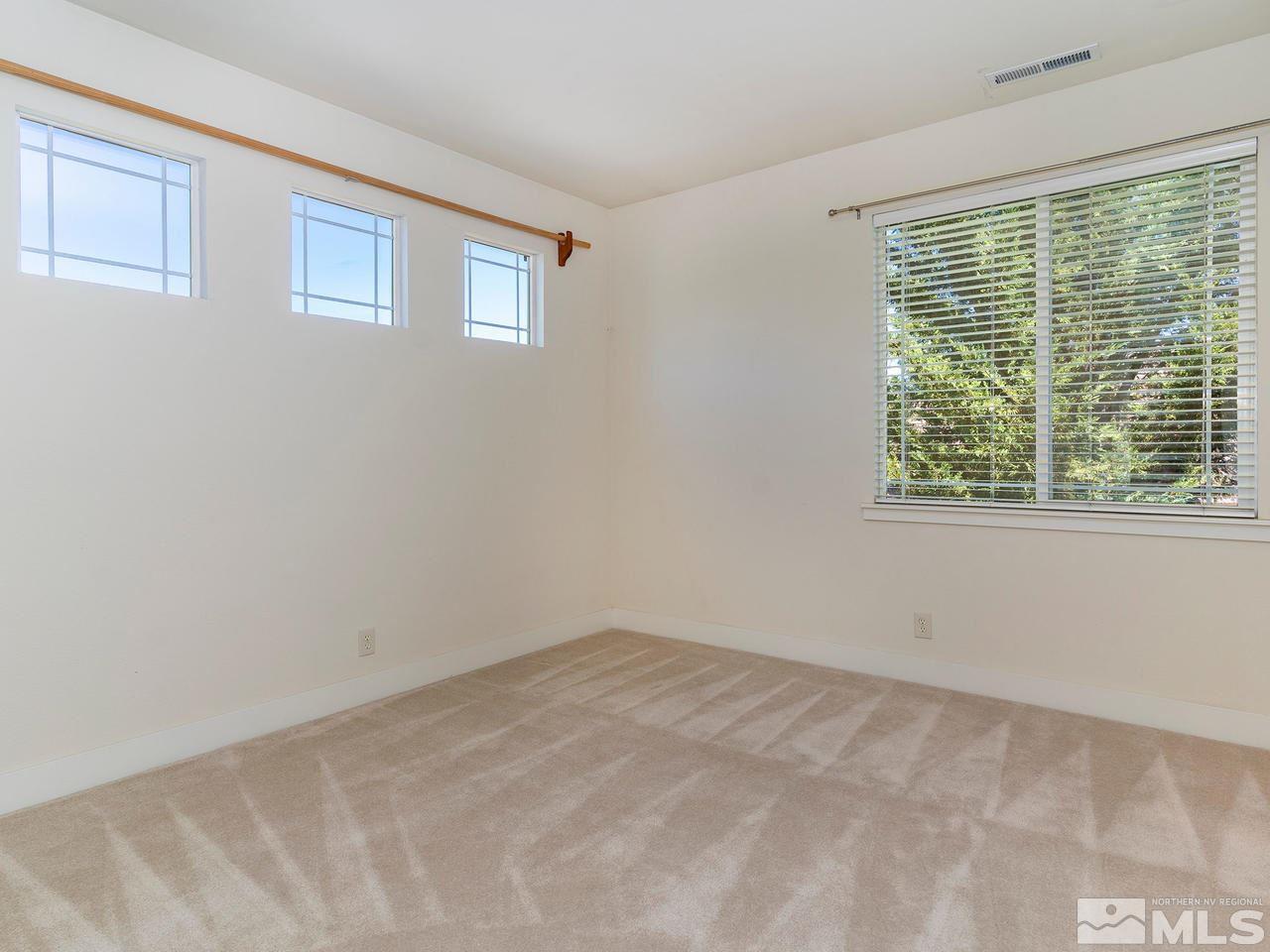 5021 Fall Colors Court Reno, NV 89519 - Photo 21 of 26 a view of an empty room with a window