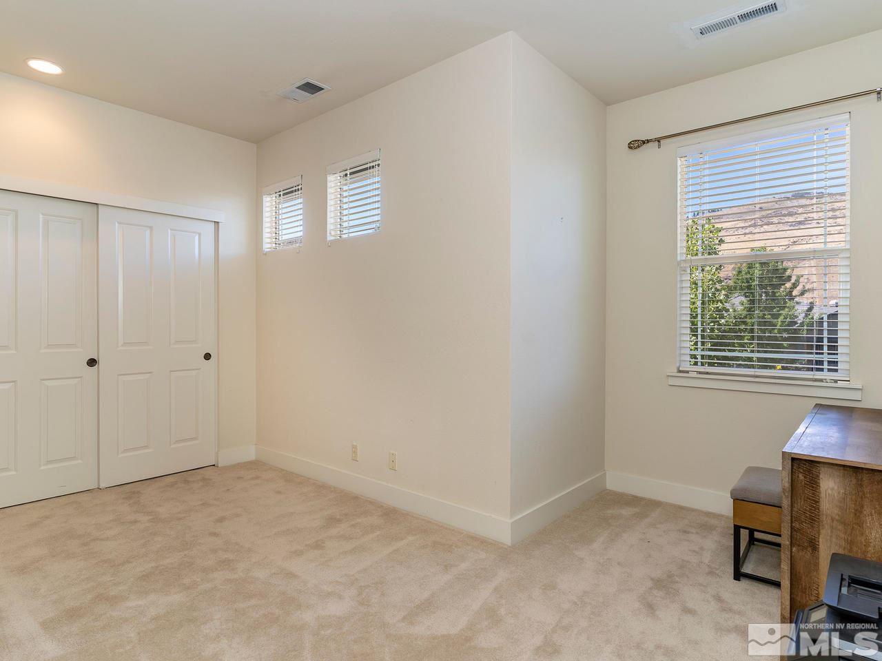 5021 Fall Colors Court Reno, NV 89519 - Photo 22 of 26 a view of an empty room with a window