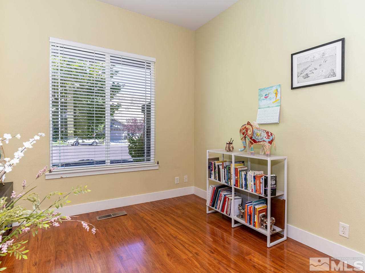 5021 Fall Colors Court Reno, NV 89519 - Photo 4 of 26 a view of room with toys and wooden floor