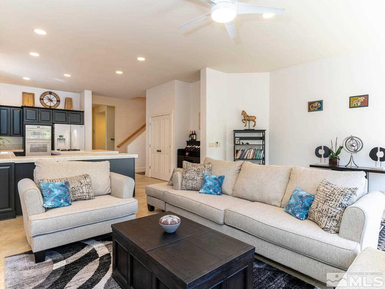 5021 Fall Colors Court Reno, NV 89519 - Photo 9 of 26 a living room with furniture and a couch