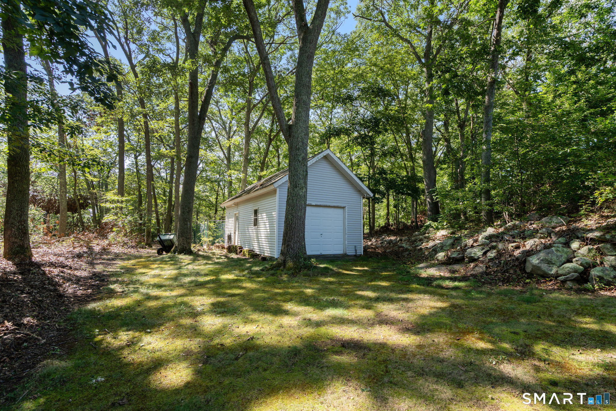 141 Briar Hill Road Groton, CT 06340 - Photo 31 of 40 The is a large shed, kennel area.