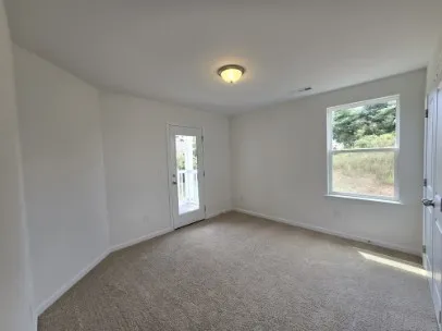 an empty room with windows