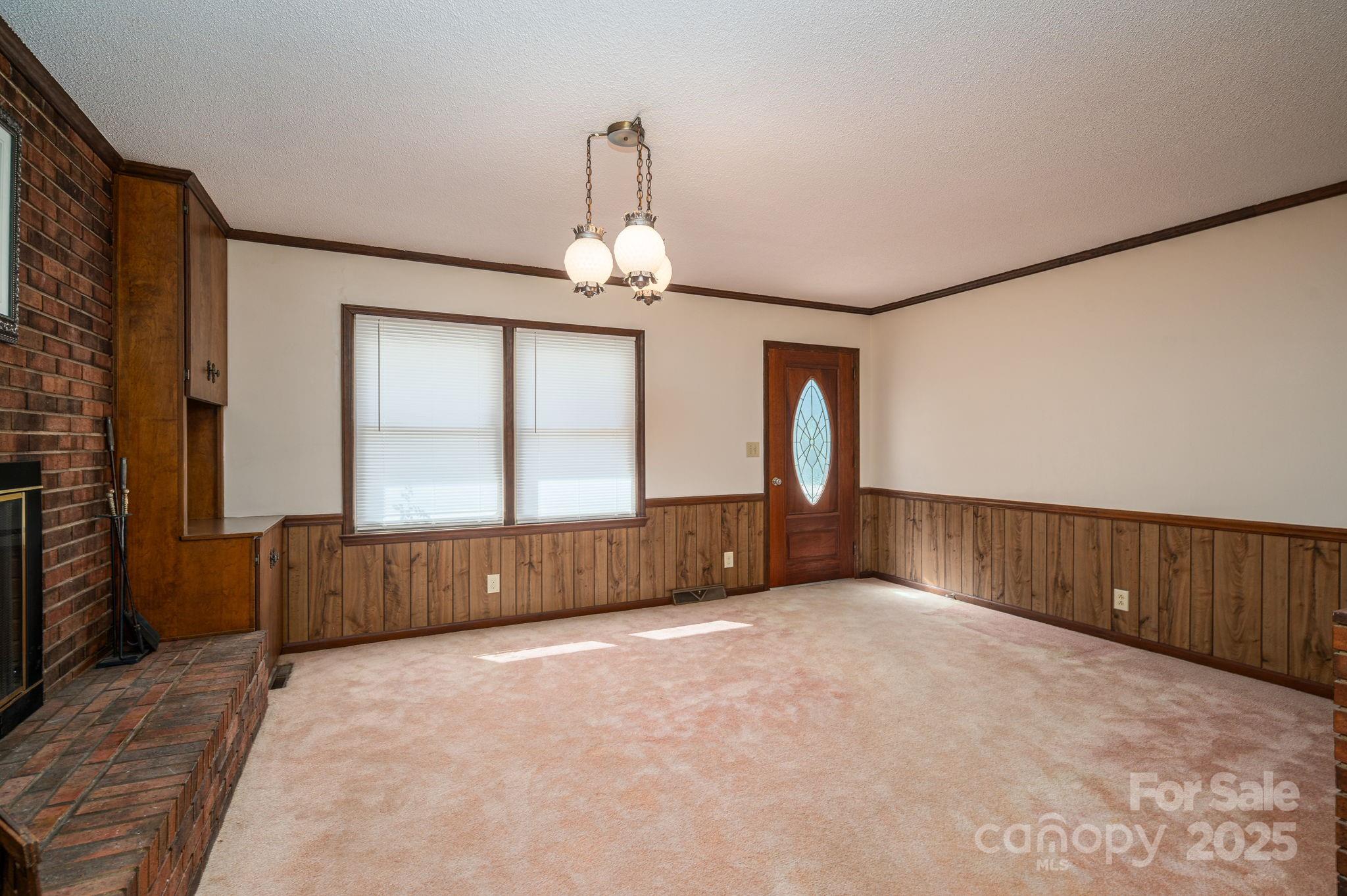 215 Suncrest Road Cherryville, NC 28021 - Photo 16 of 26 a view of a livingroom with a staircase