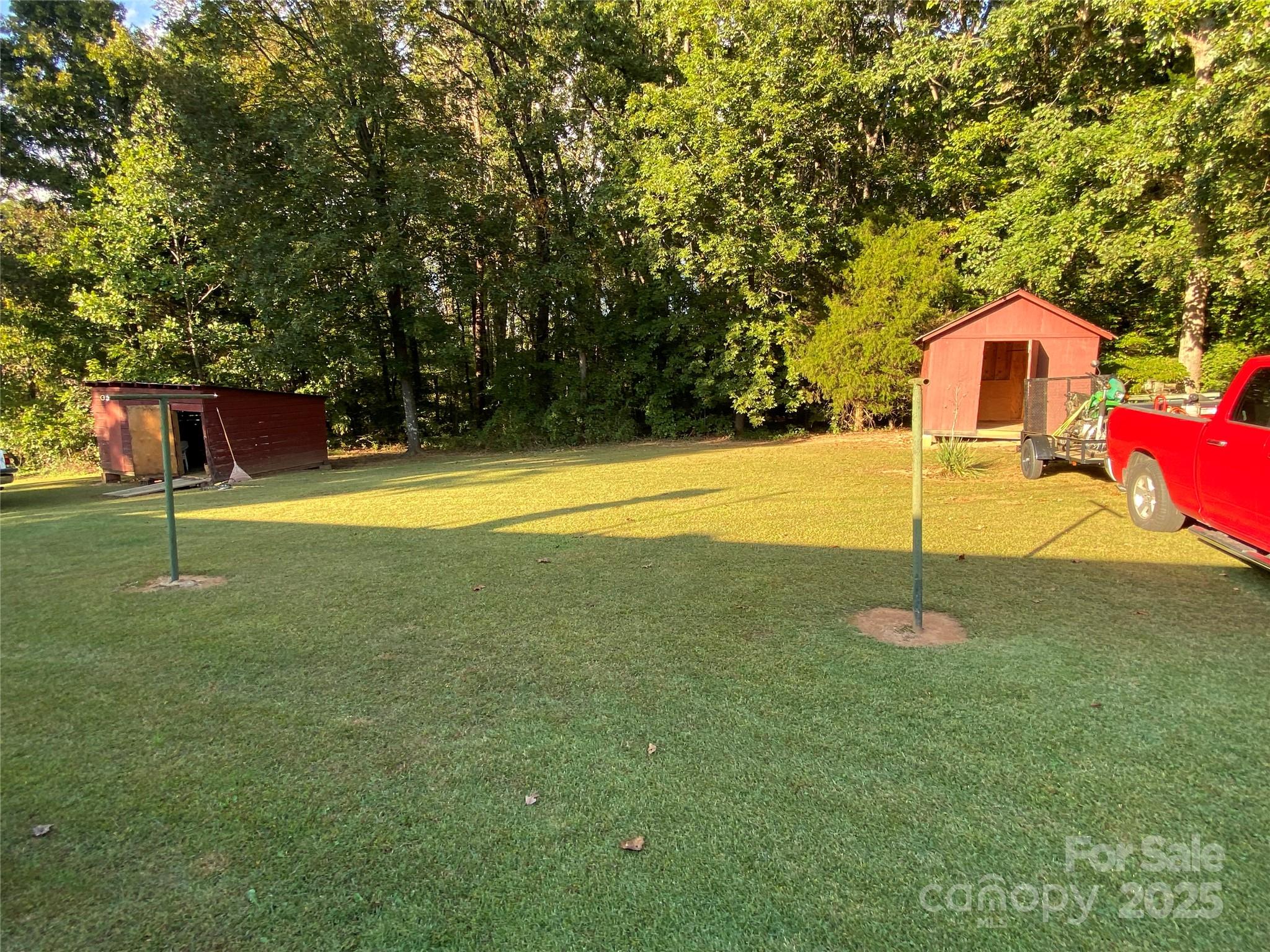 215 Suncrest Road Cherryville, NC 28021 - Photo 19 of 26 a view of a playground with basketball court