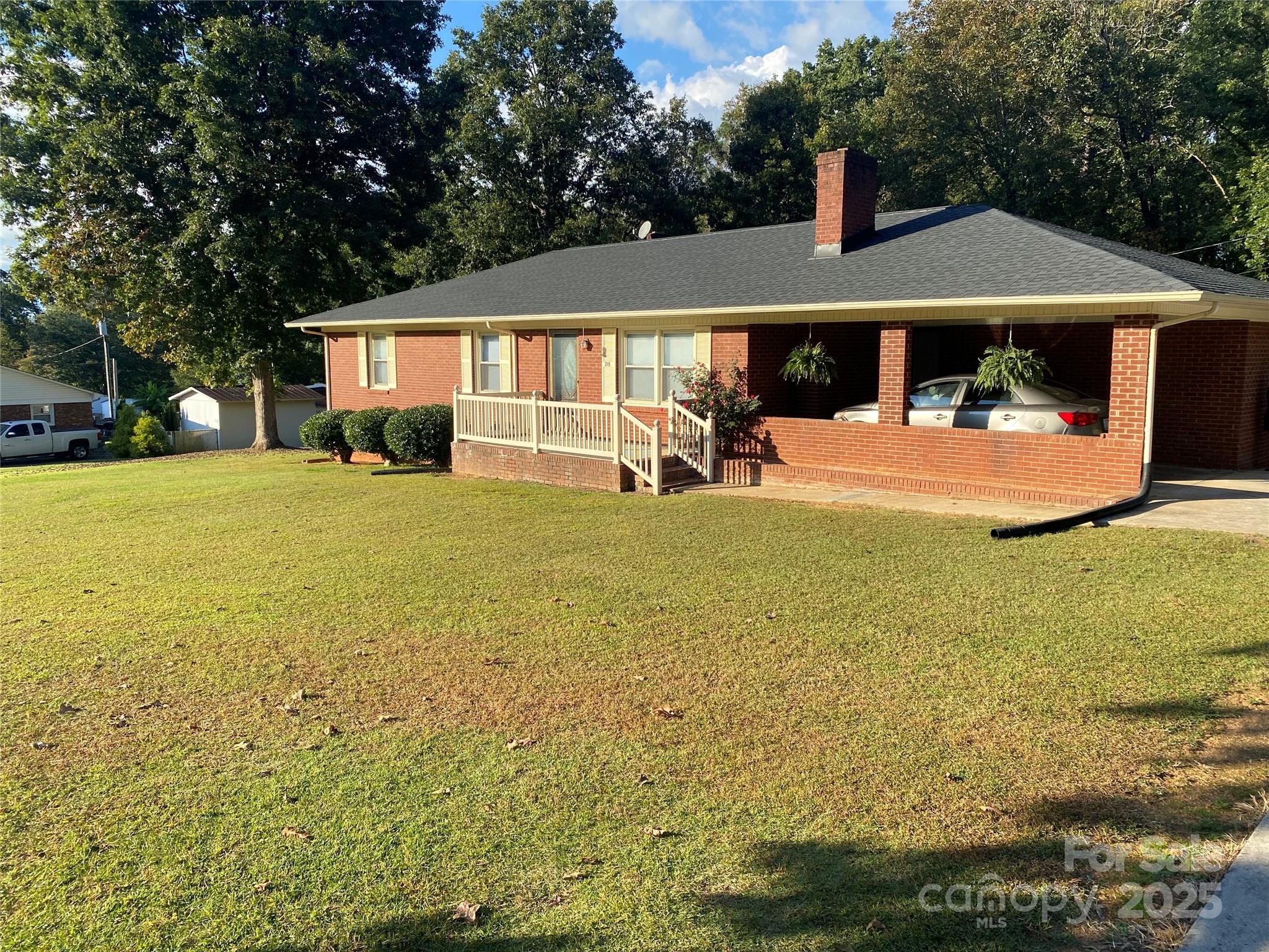 215 Suncrest Road Cherryville, NC 28021 - Photo 25 of 26 a view of a house with swimming pool and sitting area