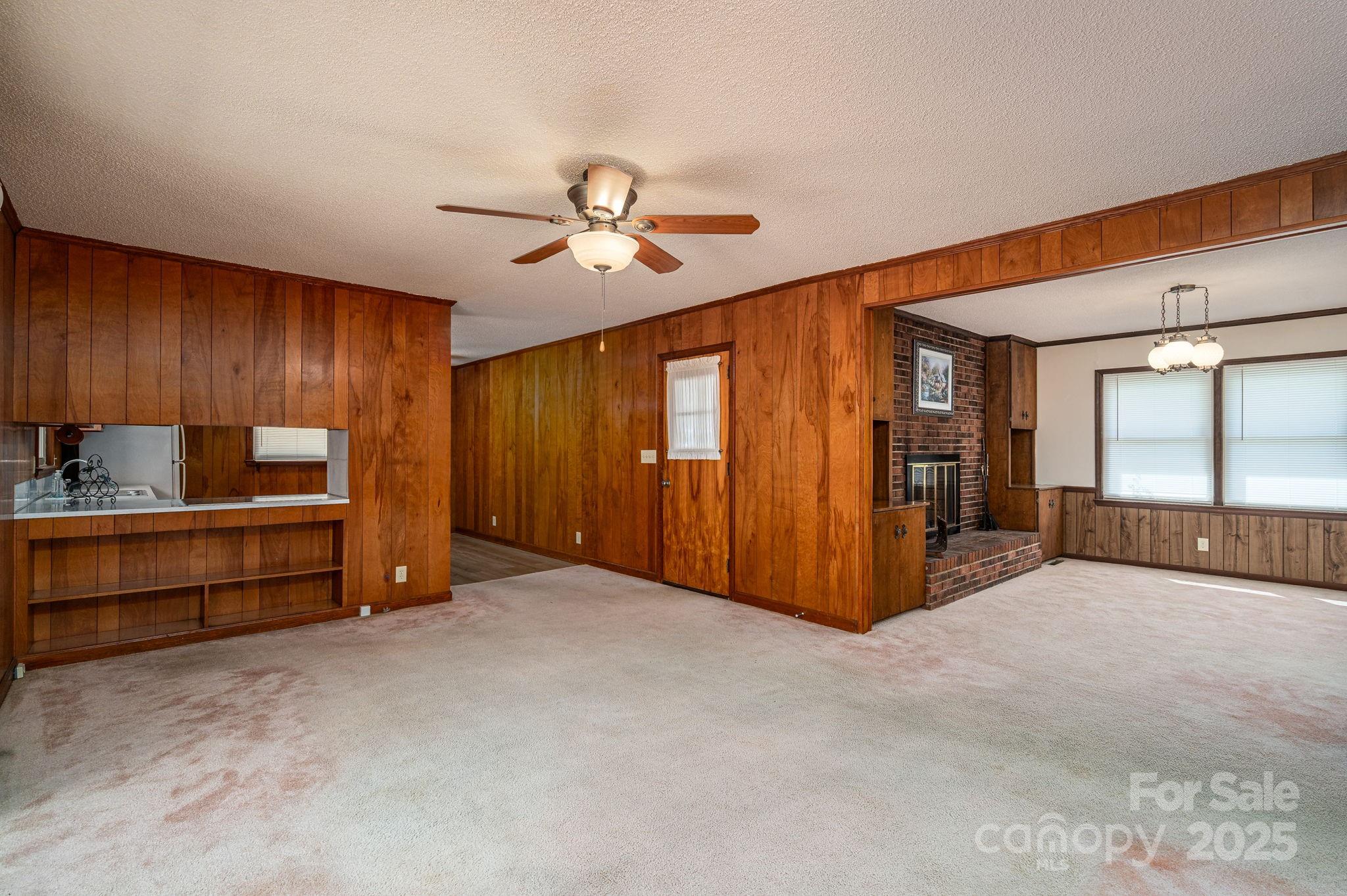 215 Suncrest Road Cherryville, NC 28021 - Photo 6 of 26 a view of an empty room with window and cabinet
