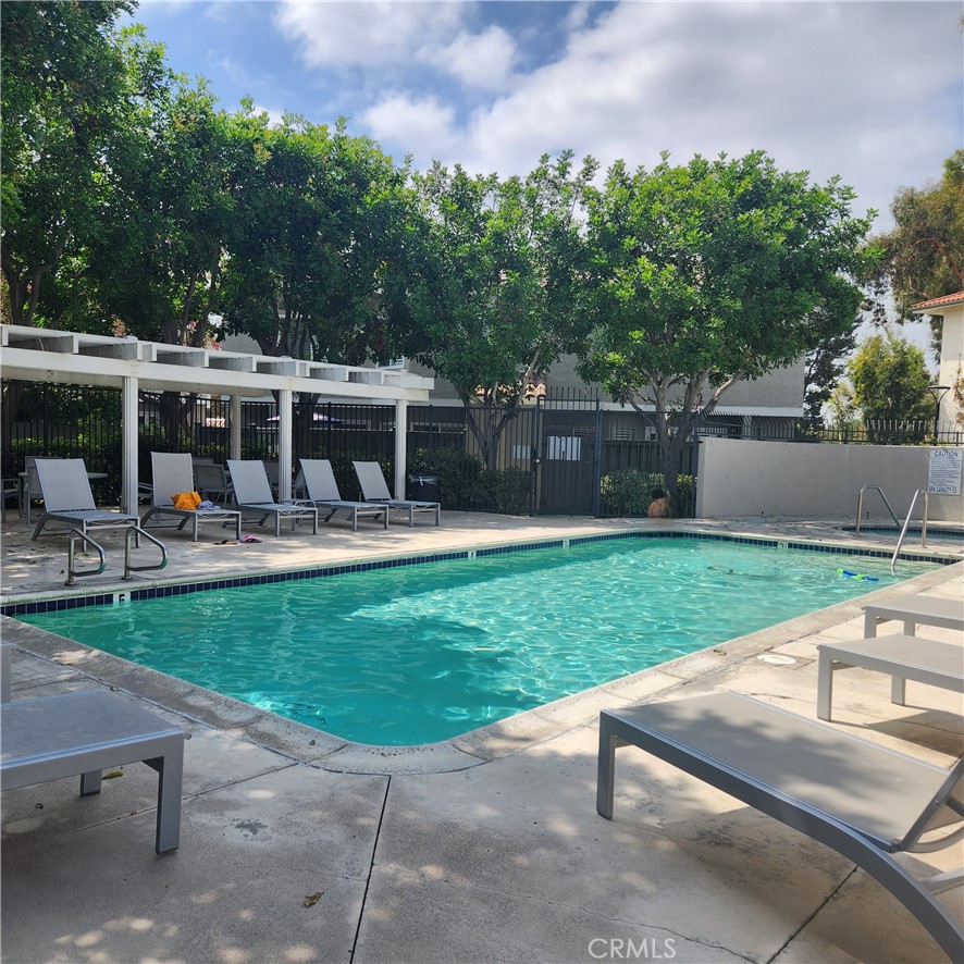266 Lemon Grove Irvine, CA 92618 - Photo 41 of 55 Pool and table seating