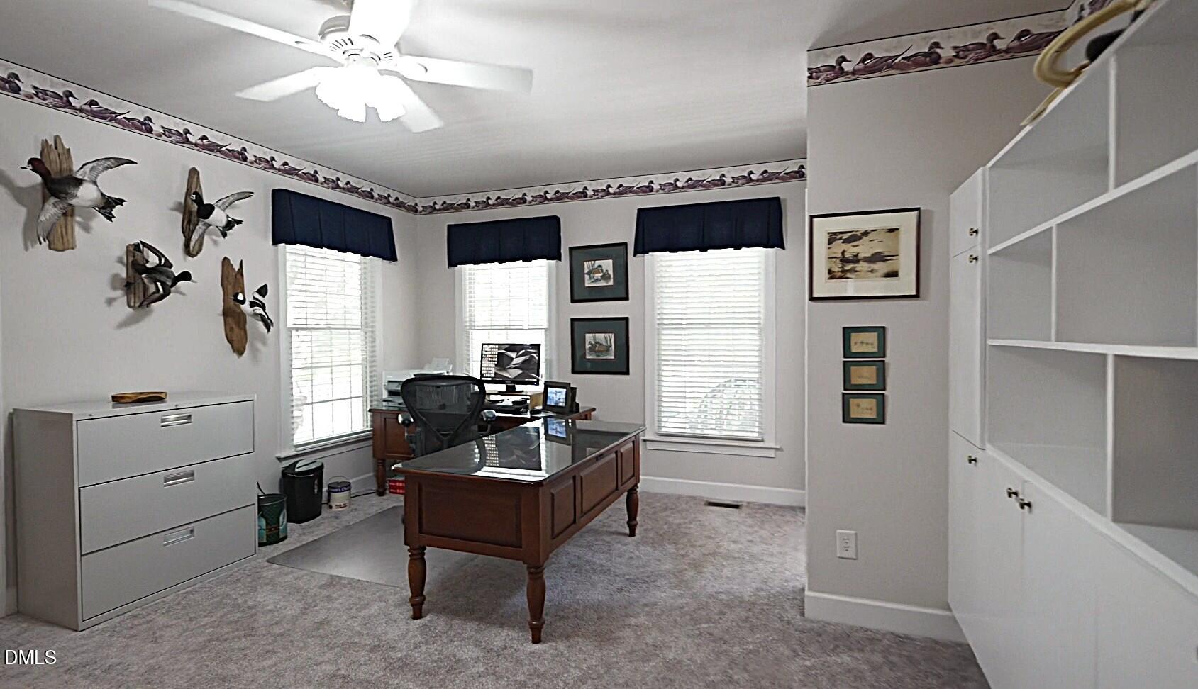 220 Jordan Narron Road Selma, NC 27576 - Photo 31 of 87 a living room with furniture and a chandelier