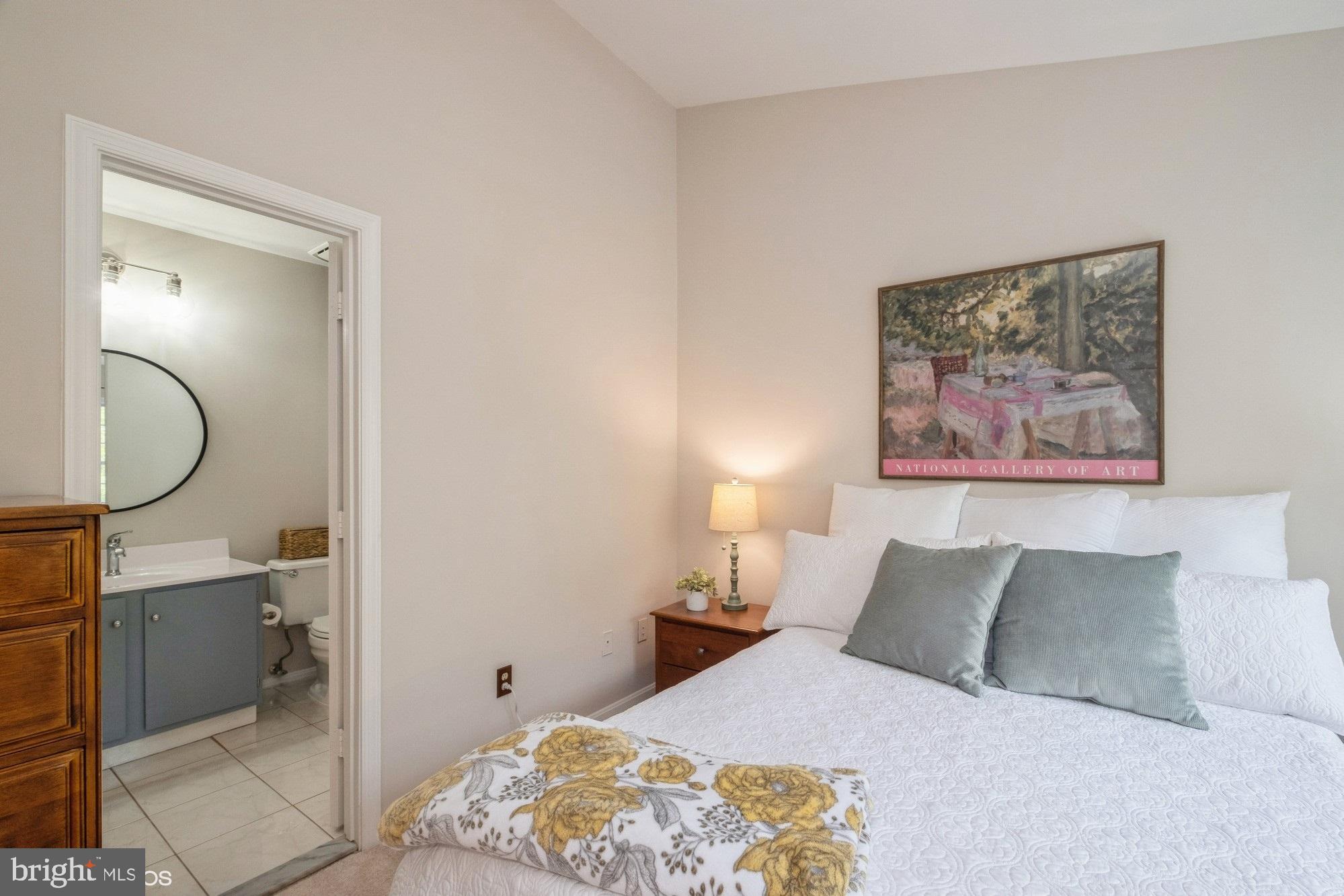77 Sudbury Square Sterling, VA 20164 - Photo 22 of 33 Door into Bathroom from Primary Bedroom