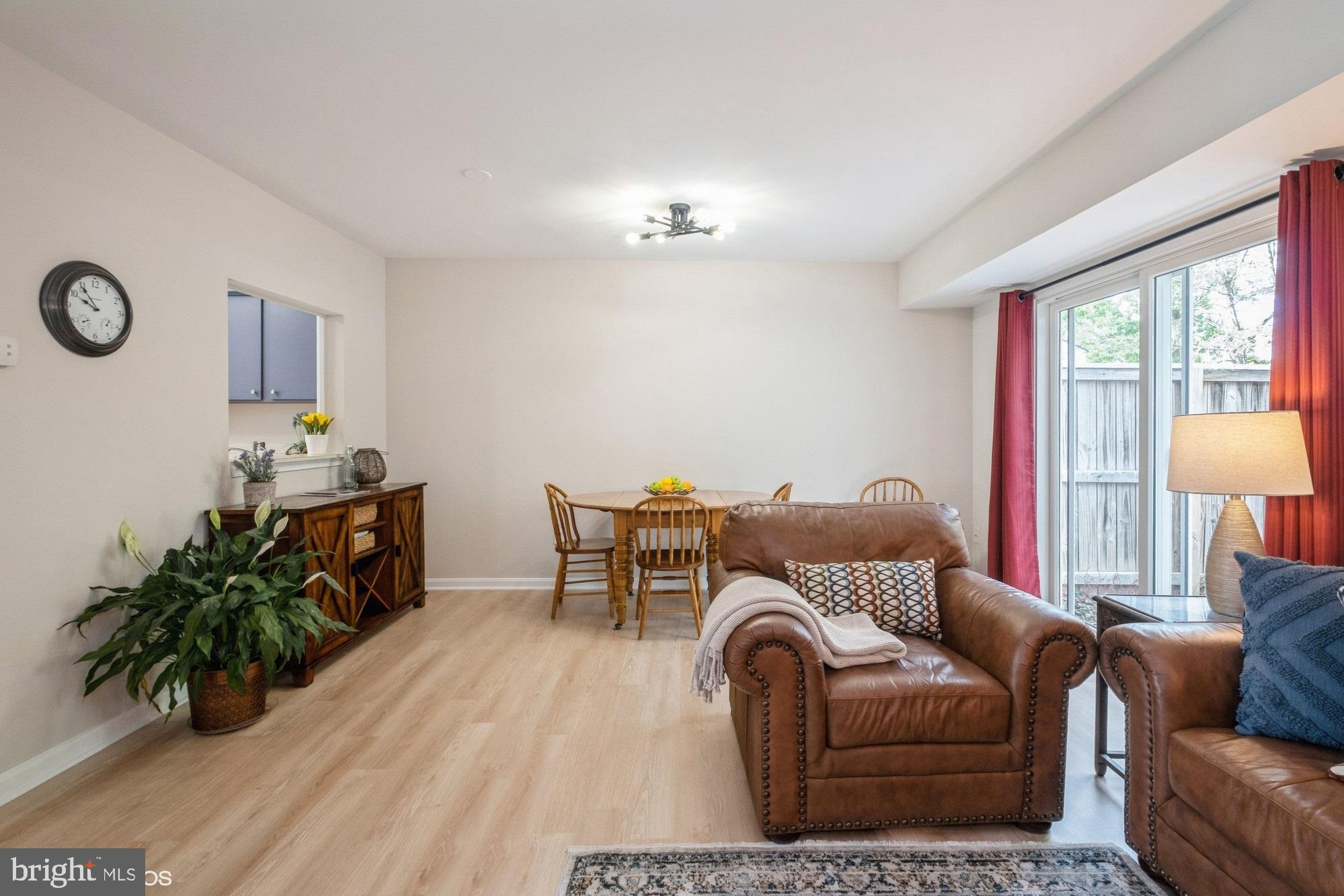 77 Sudbury Square Sterling, VA 20164 - Photo 7 of 33 Living Room to Dining Area