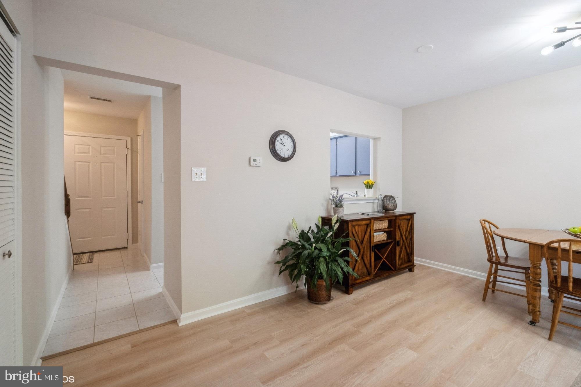 77 Sudbury Square Sterling, VA 20164 - Photo 9 of 33 View to Hallway from Living/Dining Room