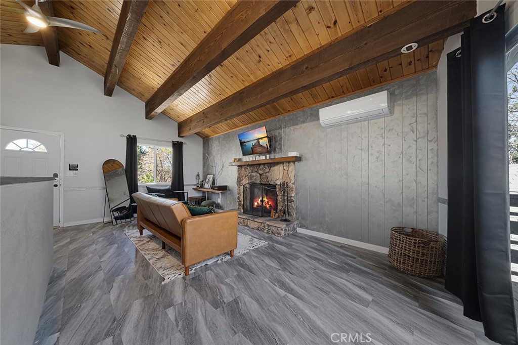 33080 Robin Lane Running Springs, CA 92382 - Photo 20 of 35 a living room with furniture and a fireplace