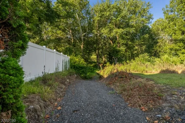 an aerial view of a houses with a lake view