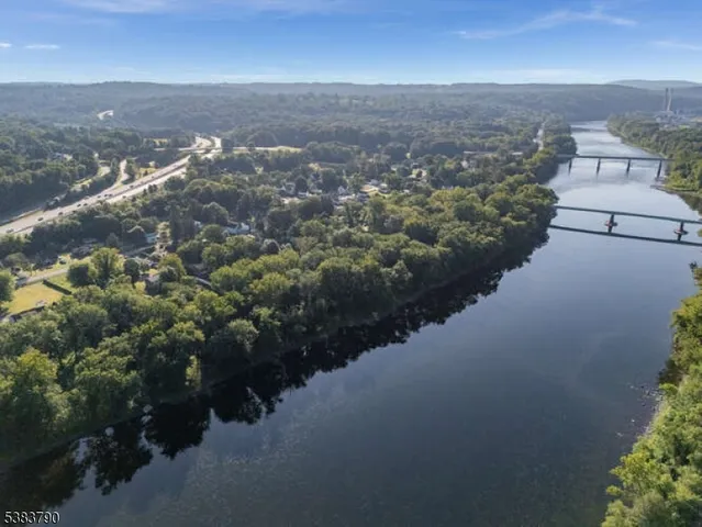 an aerial view of residential house and green space