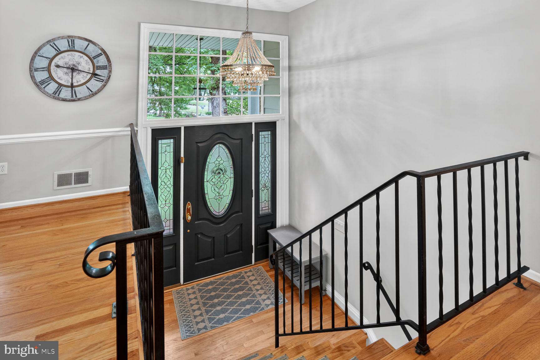 5024 Portsmouth Road Fairfax, VA 22032 - Photo 2 of 38 a view of entryway with wooden floor