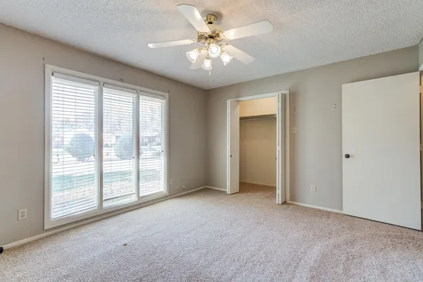 a view of a house with backyard