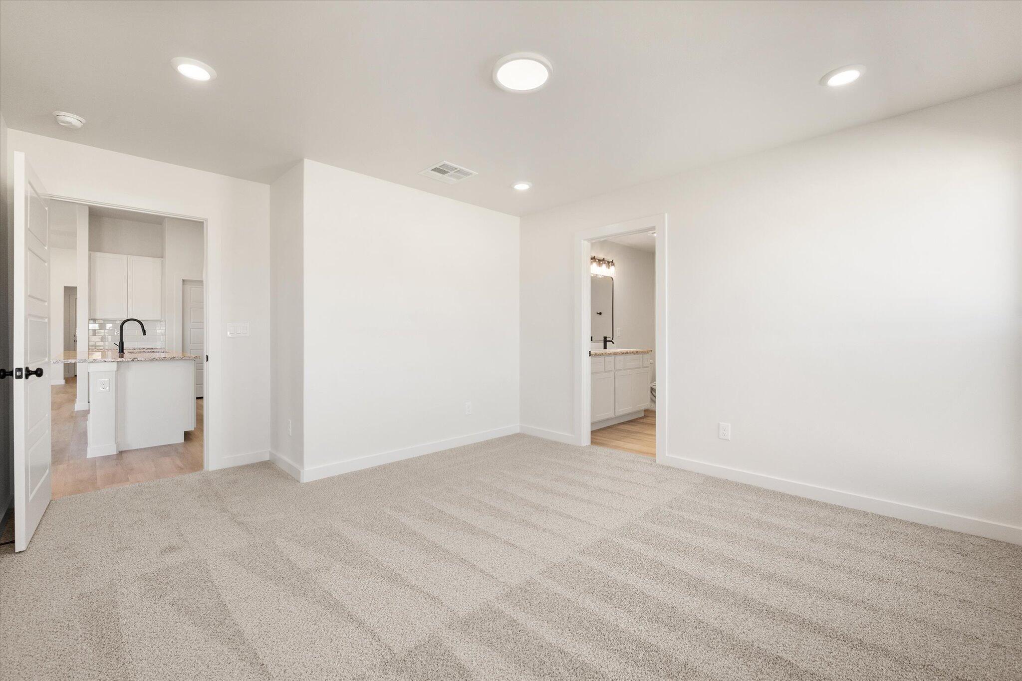 7214 8th Street Lubbock, TX 79416 - Photo 14 of 23 wooden floor in an empty room