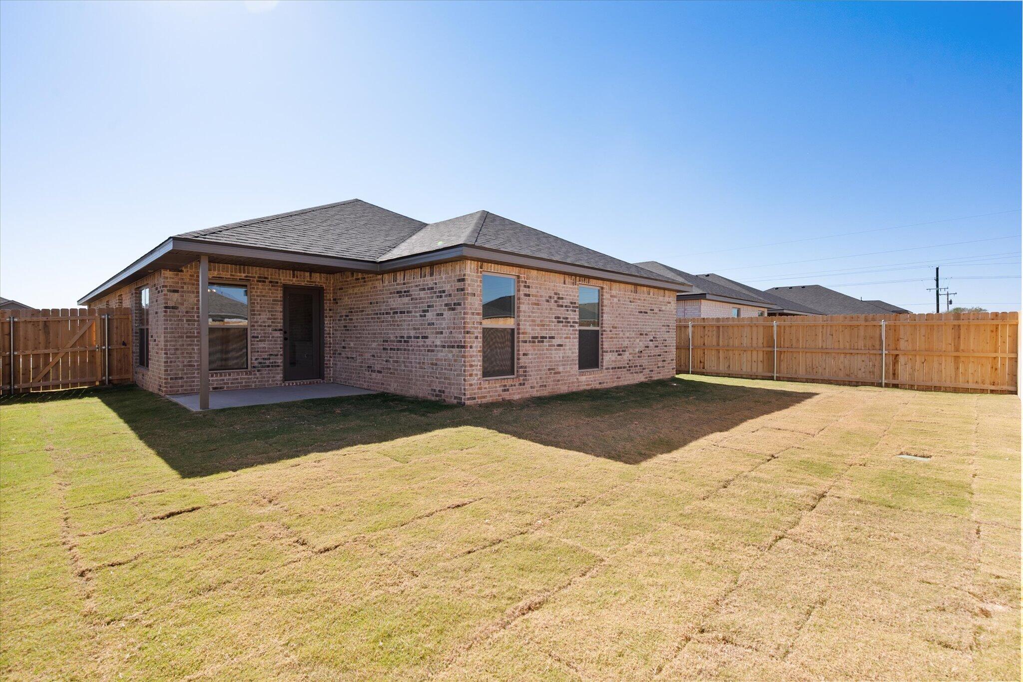 7214 8th Street Lubbock, TX 79416 - Photo 22 of 23 a backyard of a house