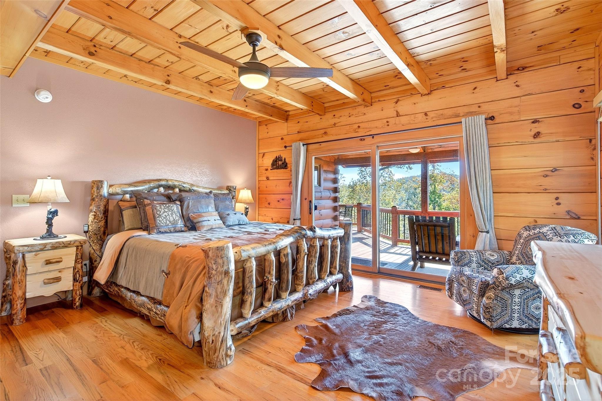 53 Osprey Lane Nebo, NC 28761 - Photo 19 of 48 a bedroom with a bed and a large window