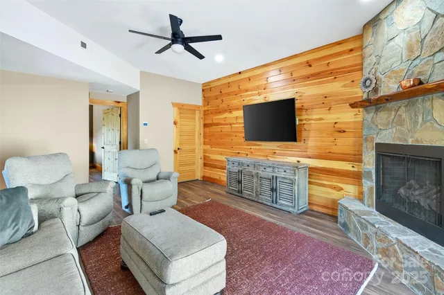 a bed room with a bed and a chair