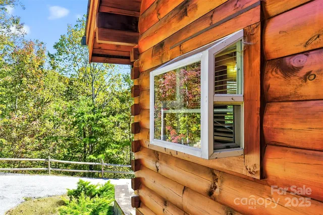 a view of balcony with furniture