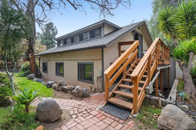 a view of a trees in front of a house