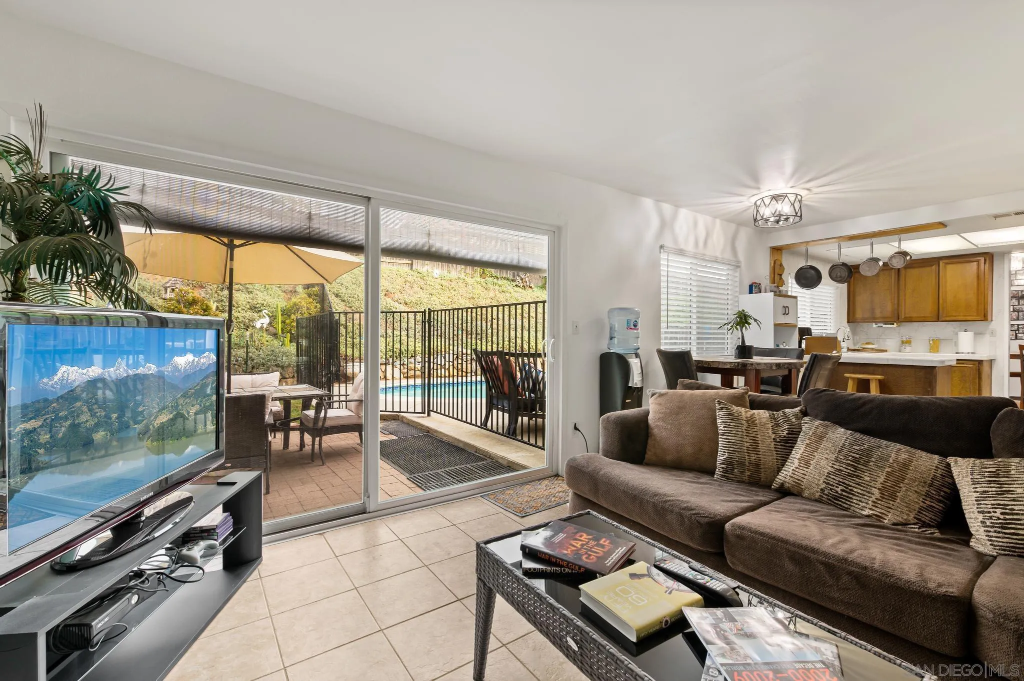 15041 Hesta Street Poway, CA 92064 - Photo 14 of 25 a living room with furniture and a flat screen tv