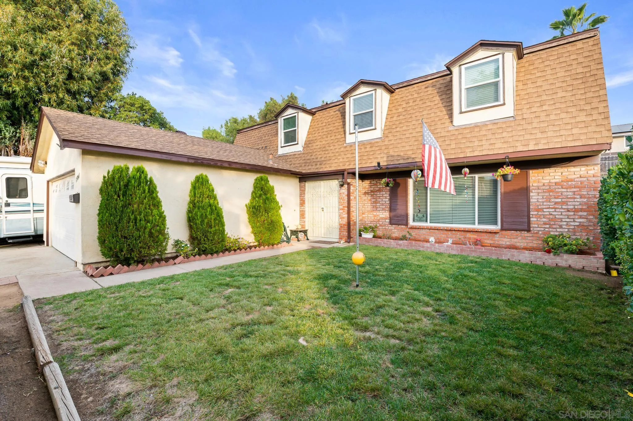 15041 Hesta Street Poway, CA 92064 - Photo 2 of 25 a front view of a house with garden