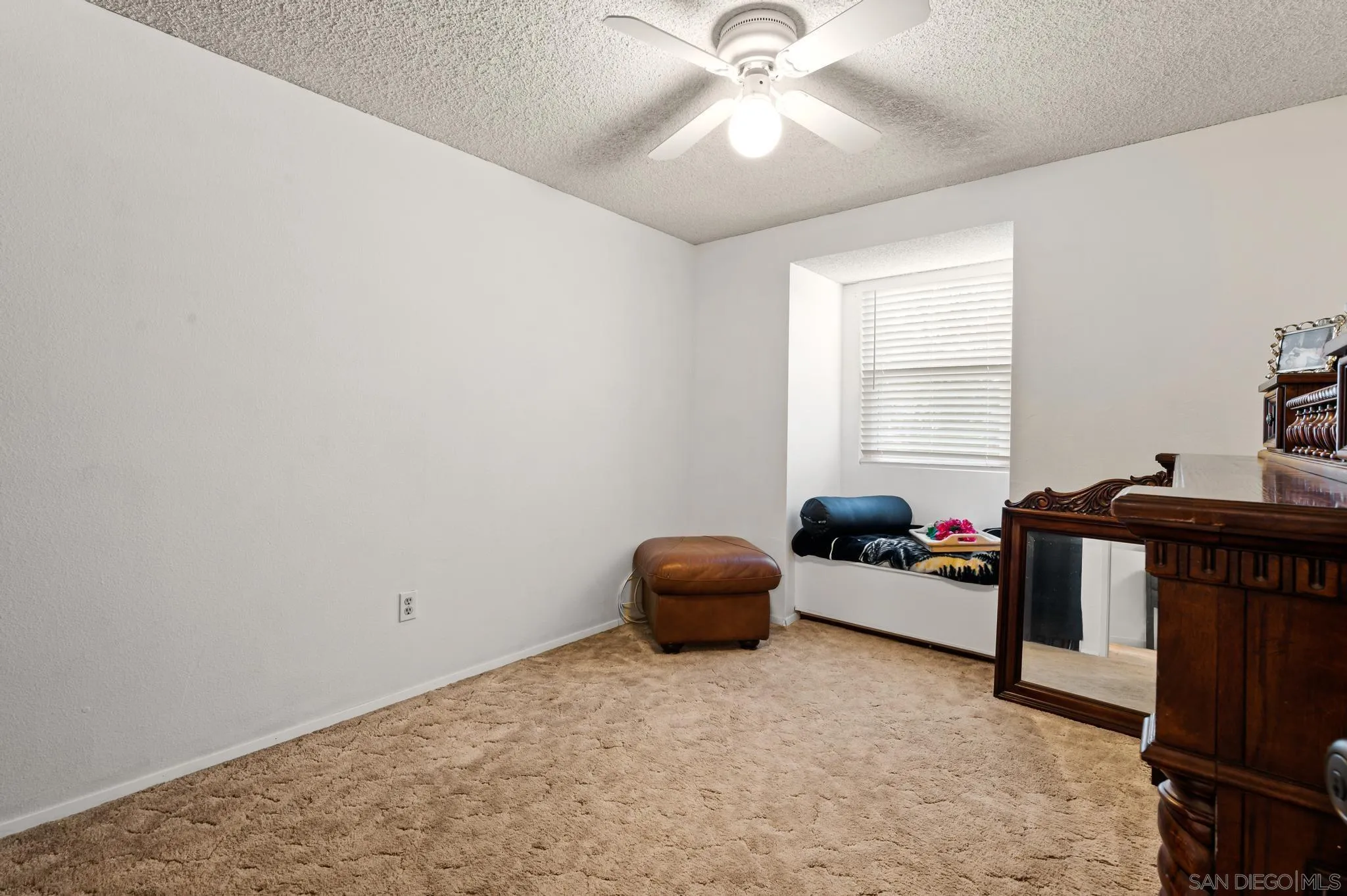 15041 Hesta Street Poway, CA 92064 - Photo 21 of 25 a bedroom with furniture and a window