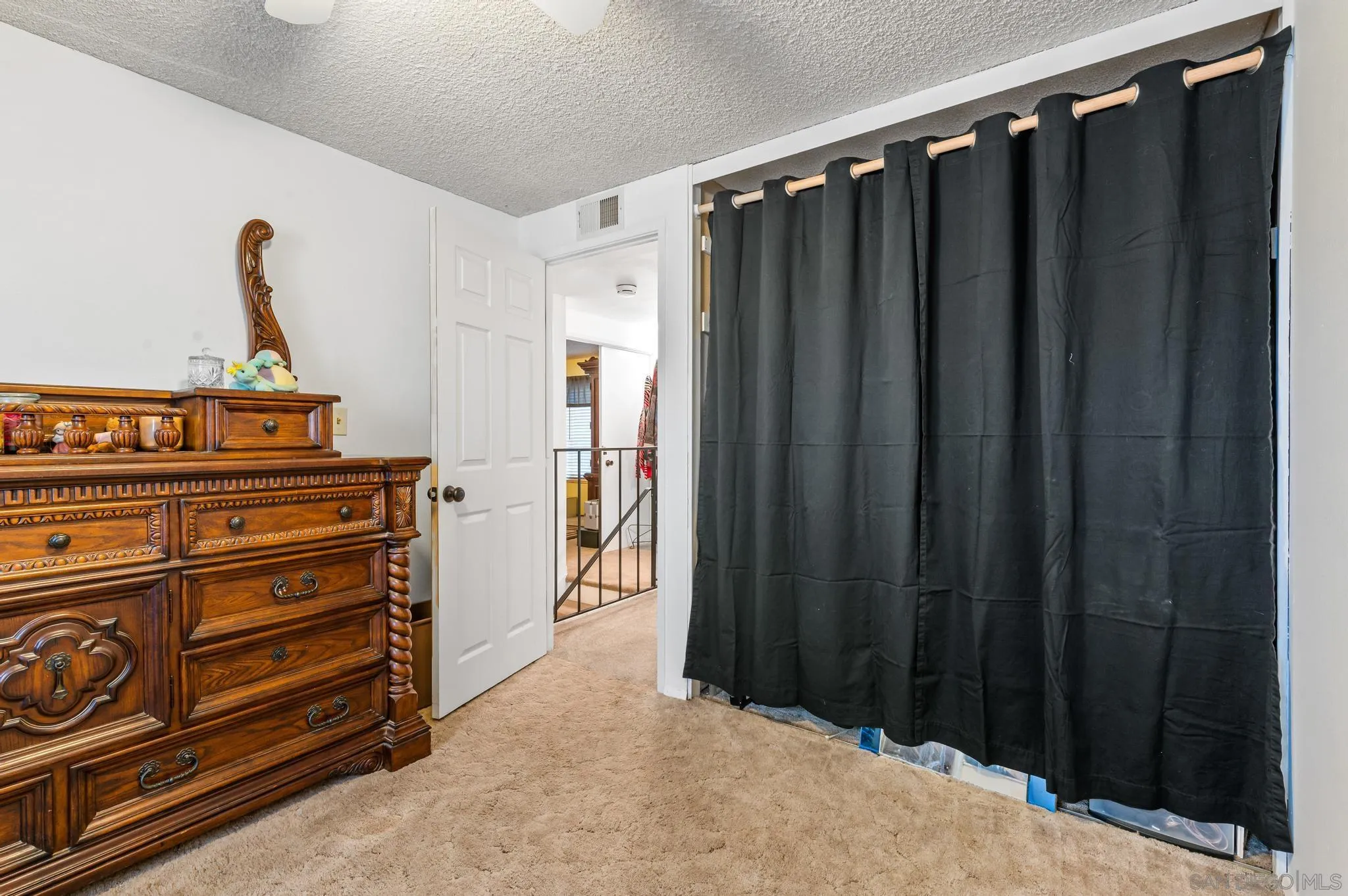 15041 Hesta Street Poway, CA 92064 - Photo 22 of 25 a view of a entryway with wooden walls